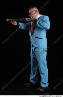MIKAEL AGENT STANDING POSE WITH SHOTGUN